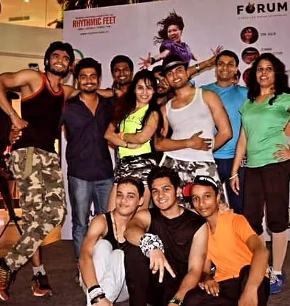 The whole crew posing after a successful Zumba session at the Forum mall. We love bringing our energy to public spaces and events.
