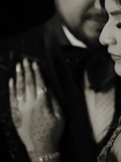 A timeless black and white portrait. This style emphasizes the emotion and connection, stripping away distractions to focus on the couple's bond.