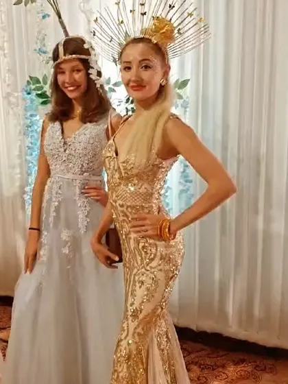 A close-up of our international artists in their beautiful gold and silver outfits. They are perfect for photo opportunities and interacting with guests.