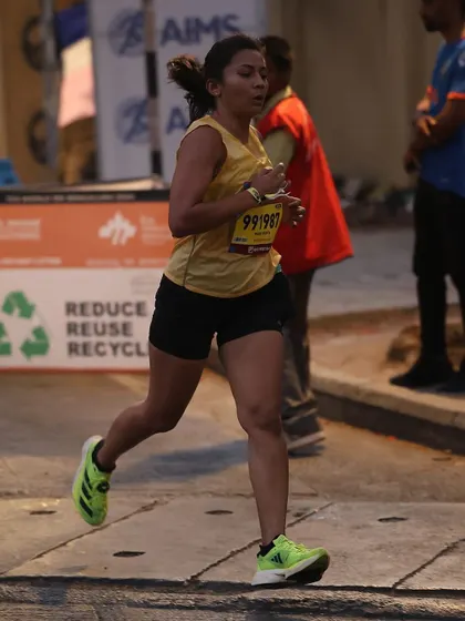 In the zone during the TCS10K. This is what it looks like to be focused on your pace, your form, and the finish line. Every step is a testament to the training.