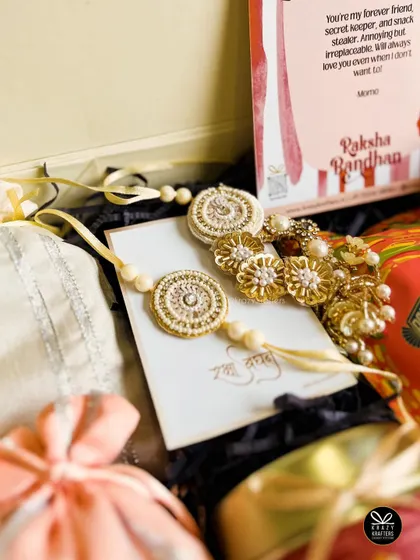 A close-up shot of the intricate details on the lumba and rakhi set.