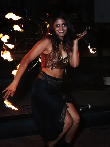 A candid moment of joy during a corporate fire show. The connection with the audience is what makes every performance feel alive and unique.