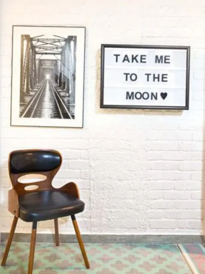 A playful detail in Alia Bhatt's home. This corner, with its simple chair and lightbox, reflects the youthful and dreamy side of her personality. It’s these little touches that make a house a home.