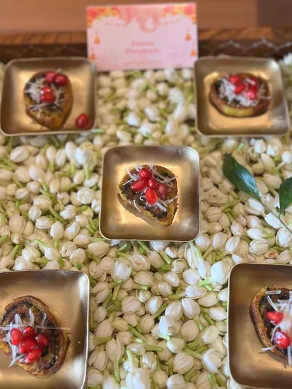 Paneer Panchratni appetizers served on a bed of fragrant jasmine flowers. This was part of the bespoke, no onion, no garlic menu we designed for a client's festive celebration.