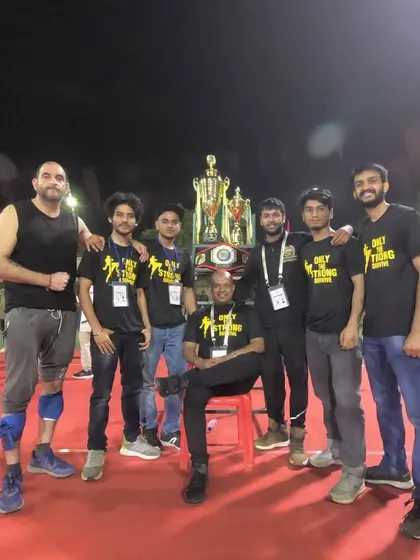 Posing with the trophies. A proud moment for Team Dynamic, showcasing the results of months of hard work, intelligence, and teamwork.