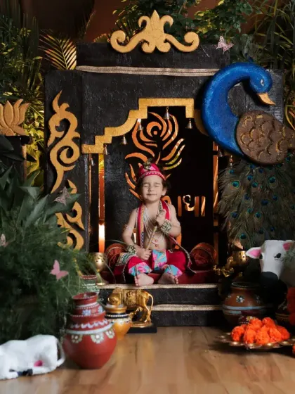 A smiling little Krishna holding his flute. Our Janmashtami set is designed to be a magical space where kids can feel like they are part of the story.