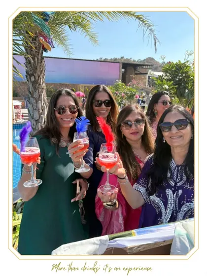 A group of ladies enjoying cocktails at a sunny brunch. Our service is perfect for daytime events, providing refreshing drinks and a fun atmosphere.