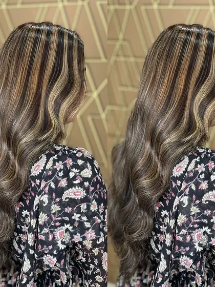 Brighten up your look with expertly placed highlights. These fine babylights create a natural, sun-kissed effect that adds dimension and shine.