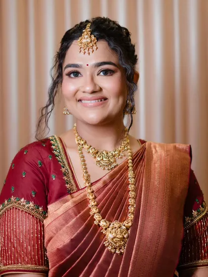 A happy and radiant portrait of Sowmya. The makeup is kept fresh and minimal to let her natural beauty shine.