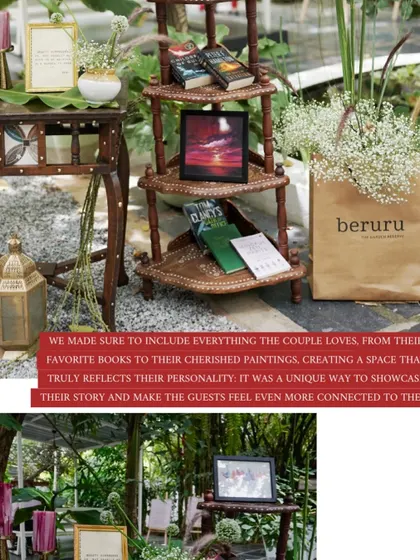 A personalized corner at a wedding, featuring the couple's favorite books and paintings, telling their story through their passions.