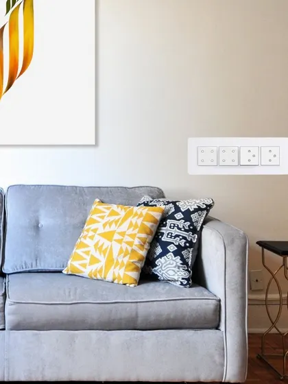 Our white WiFi smart switches blend perfectly with any modern living room decor. They provide feather-touch control and connect your home to our smart ecosystem, fitting into your existing switchboards without any alteration.