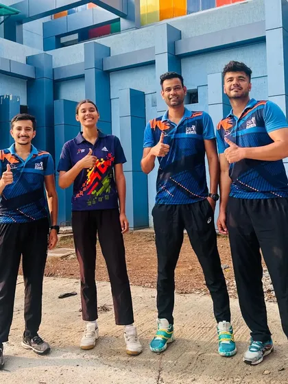 A moment of camaraderie with fellow athletes. Building strong relationships off the court translates to better teamwork and communication during a match.