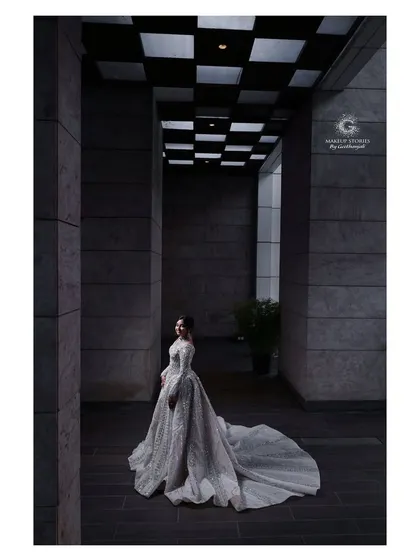 Harini in a breathtaking bridal gown. My training also covers Western bridal looks, focusing on ethereal, glowing makeup that enhances the bride's features without overpowering the dress.