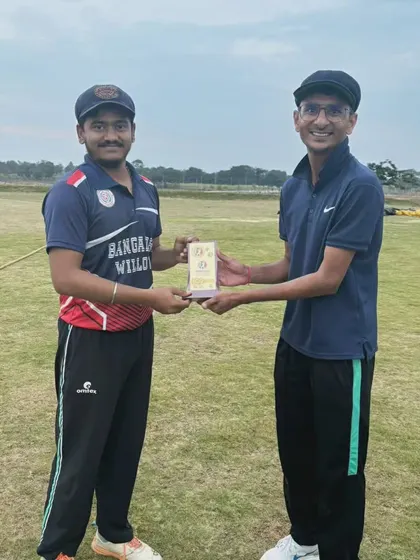 A young player receiving an award, highlighting our focus on nurturing talent from a young age.