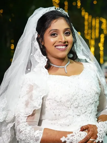 A portrait of my lovely Christian bride. Her smile says it all. I gave her a fresh, radiant makeup look with a simple tiara and veil.