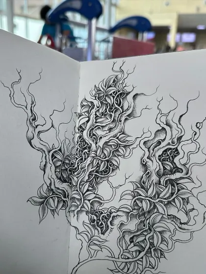 The vine drawing in my sketchbook, seen from a different perspective.