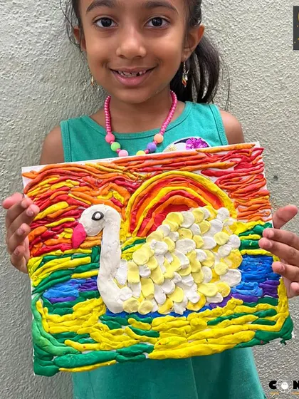The detail in this playdough swan is incredible. She carefully placed each "feather" one by one, showing amazing patience and dedication to her artwork.