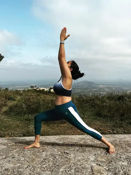 A powerful Virabhadrasana I, or Warrior I. This pose helps me feel like my own warrior, strong enough to create positive change in my life, grounded in my own power and intention.