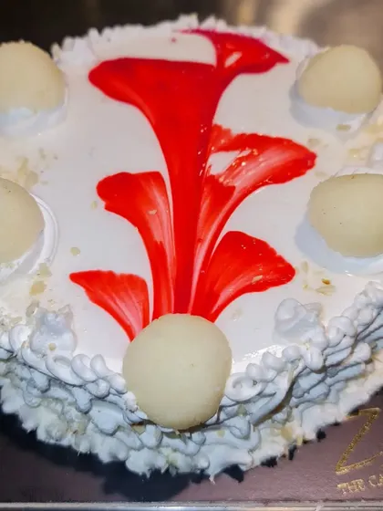 A delightful Rasgulla cake, another one of my popular fusion creations. This cake is topped with soft, spongy rasgullas and has a light, creamy texture.