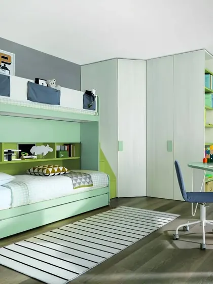 A shared kid's room with a green and grey color scheme. The bunk bed has an integrated wardrobe and bookshelf, and a separate desk provides a dedicated study space.