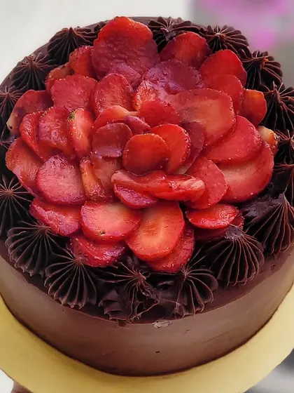It's strawberry season! This is my rich Belgian Chocolate cake filled and topped with fresh strawberries. A classic combination that never disappoints.