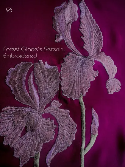 Forest glade's serenity, embroidered. This design features purple irises, capturing their delicate and complex structure through detailed threadwork.