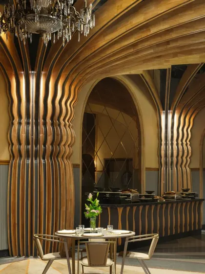 At Nishtara Banquet Hall, we crafted an environment of grandeur and warmth. The intricately detailed rubberwood columns and vaulted ceilings are inspired by Kolkata's rich architectural heritage, creating a memorable setting for significant life moments.