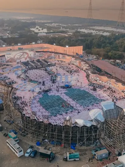 An aerial view of the sheer scale of a reception I planned. This shot shows the massive, custom-built structure before the celebration began, a testament to our grand execution.