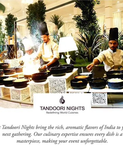 Our team of chefs at a live cooking station, ready to serve guests. Dressed in traditional attire, they add to the authentic and immersive experience of the event.