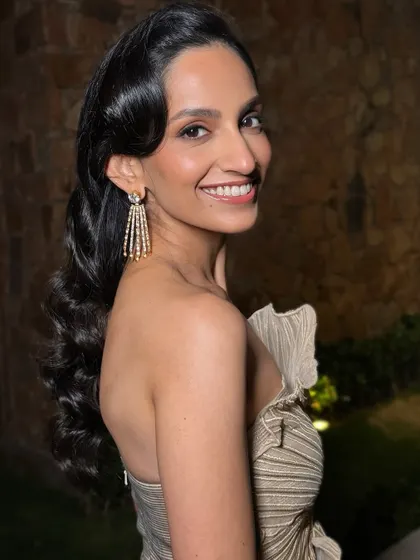 Where vintage meets modern sophistication. This cocktail look features classic Hollywood waves and soft, elegant makeup.