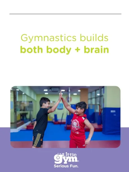 Gymnastics builds both body and brain. A high-five between friends after completing a challenge is a perfect example of 'Citizen Kid' in action, fostering teamwork, encouragement, and social skills.