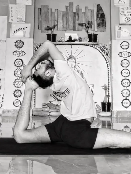 Nishant Sir demonstrating Eka Pada Rajakapotasana, a deep backbend and hip-opening asana.