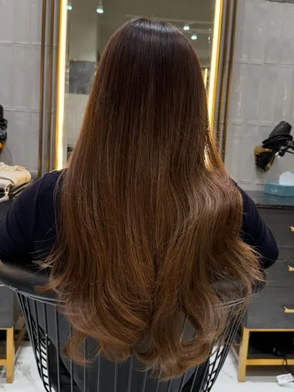 A straight and sleek version of the ash brown color, showing its versatility and rich, even tone.