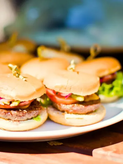 Another shot of our popular mini burgers, a guaranteed crowd-pleaser for corporate parties and casual gatherings alike.
