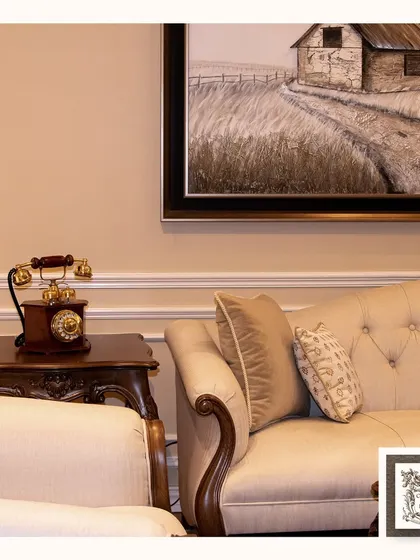 This classic rotary-style telephone is a delightful piece of nostalgia. It's not just decor, it's a conversation starter that evokes an era of timeless elegance and charm.