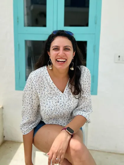 A big, happy laugh. This photo captures a moment of pure, simple joy.