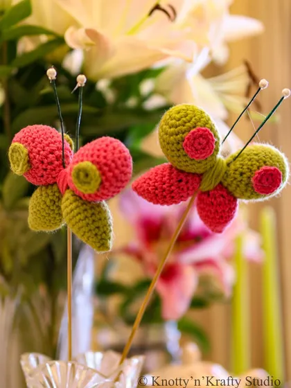A close-up of the Happy Butterflies, showing their quirky, colourful design and beaded antennae.