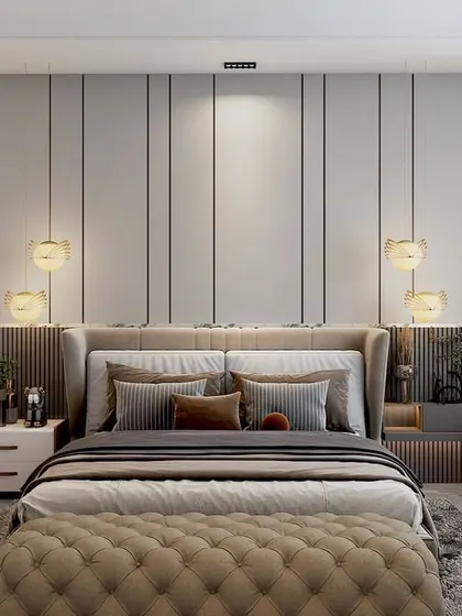 This master bedroom in Vasant Kunj is dominated by light, neutral colors. The focus is on textures and silhouettes, with vertical grooves on the bed-back wall adding depth.