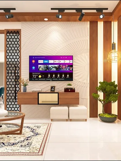 An open-plan view showing the living and dining areas. The design uses elements like a jali partition and consistent wood tones to create a cohesive yet distinct feel for each zone.