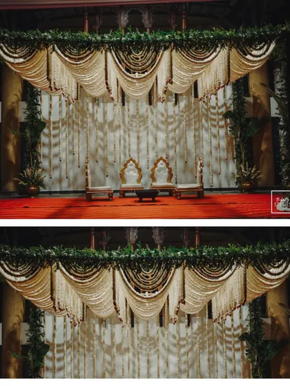 Another view of the stunning traditional wedding stage, highlighting the intricate floral drapery and classic design.