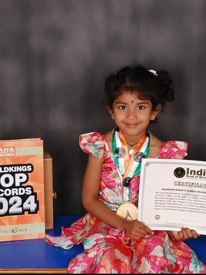 We celebrate every child's unique talents. We are incredibly proud of our student, Aarna N, who set a record with the India Book of Records and Asia Book of Records for solving 53 types of Rubik's Cubes at just three years old.