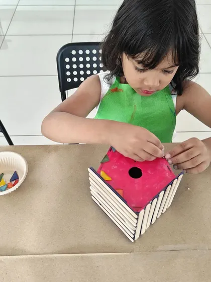 A birdhouse building station was the perfect activity for this 6th birthday party. It's a great example of a fun, engaging, and memorable party craft that goes beyond paper and crayons.
