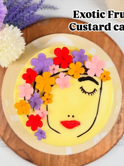 Our Exotic Fruit Custard cake, part of the Women's Day collection, features a light custard base topped with a beautiful, handcrafted floral face design. It's a tribute to artistry and flavour.