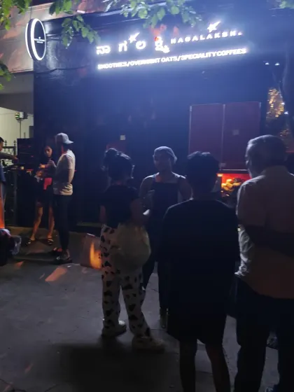 The scene outside Nagalakshmi after dark. The word got out fast, and our community showed up. This is the social proof that people are looking for honest, healthy food to support their goals.