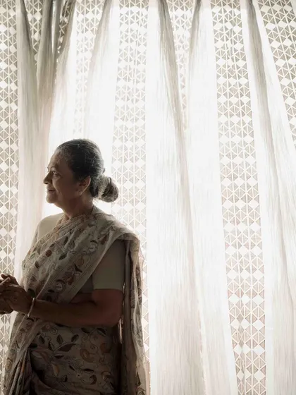 A graceful portrait of her, looking out the window. There is a serene and timeless beauty in her expression, a quiet strength that I wanted to capture.