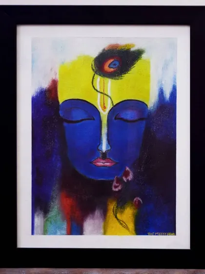 The 'Meditating Krishna' soft pastel artwork, presented in a clean black frame. Framing completes the piece, making it ready to be a focal point on any wall.