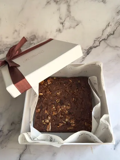 A classic choice for Diwali gifting, this box contains my signature fudgy walnut brownie. It's a simple yet elegant gift that is always appreciated for its rich flavor and premium quality.