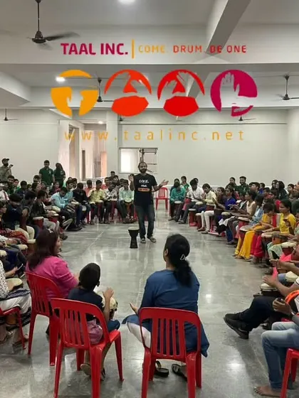 Another view of the large, inclusive drum circle with the Robin Hood Army. The circle format ensures everyone is seen and can participate, creating a powerful sense of belonging and joy.
