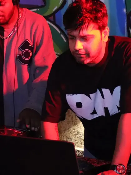 Spinning beats and creating memories during a club night. I enjoy the focused, high-energy environment of a club, where I can dive deep into specific genres.