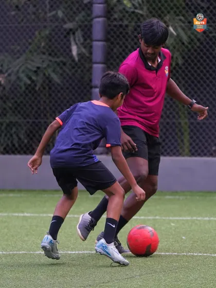 Close-up coaching in action. We work on every detail to help our players master the fundamentals of the game.